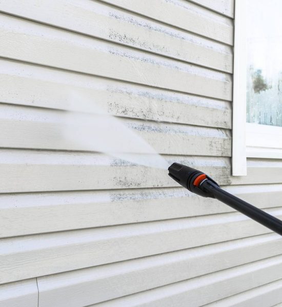 cleaning a house exterior